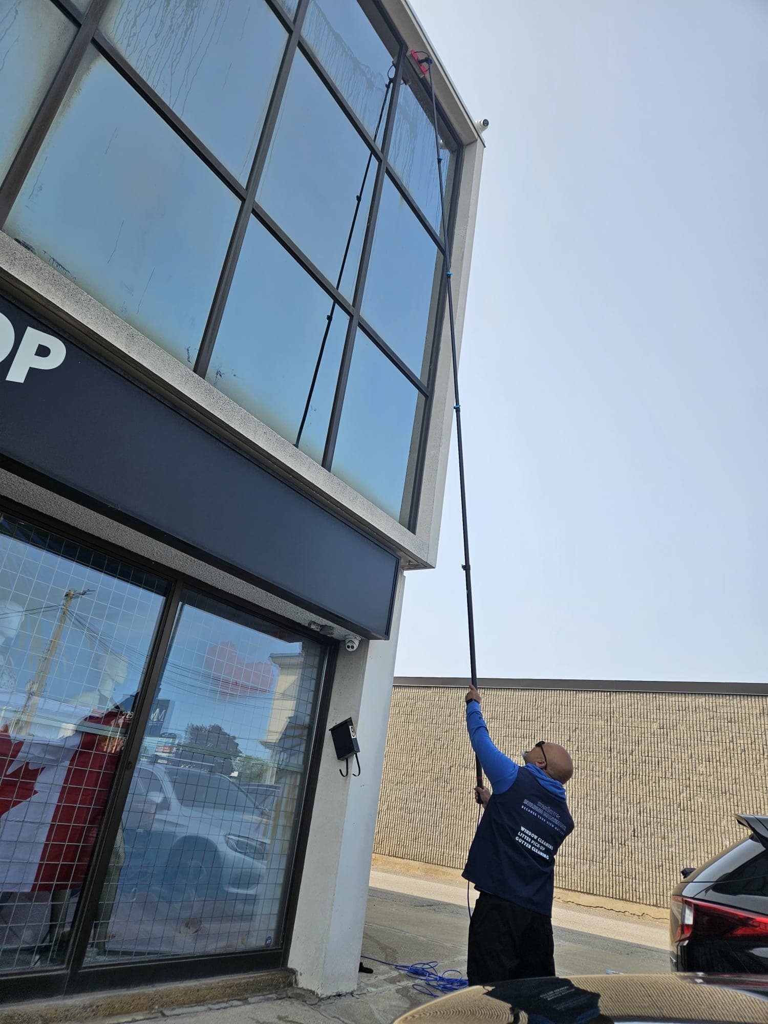 Professional window cleaning service in action